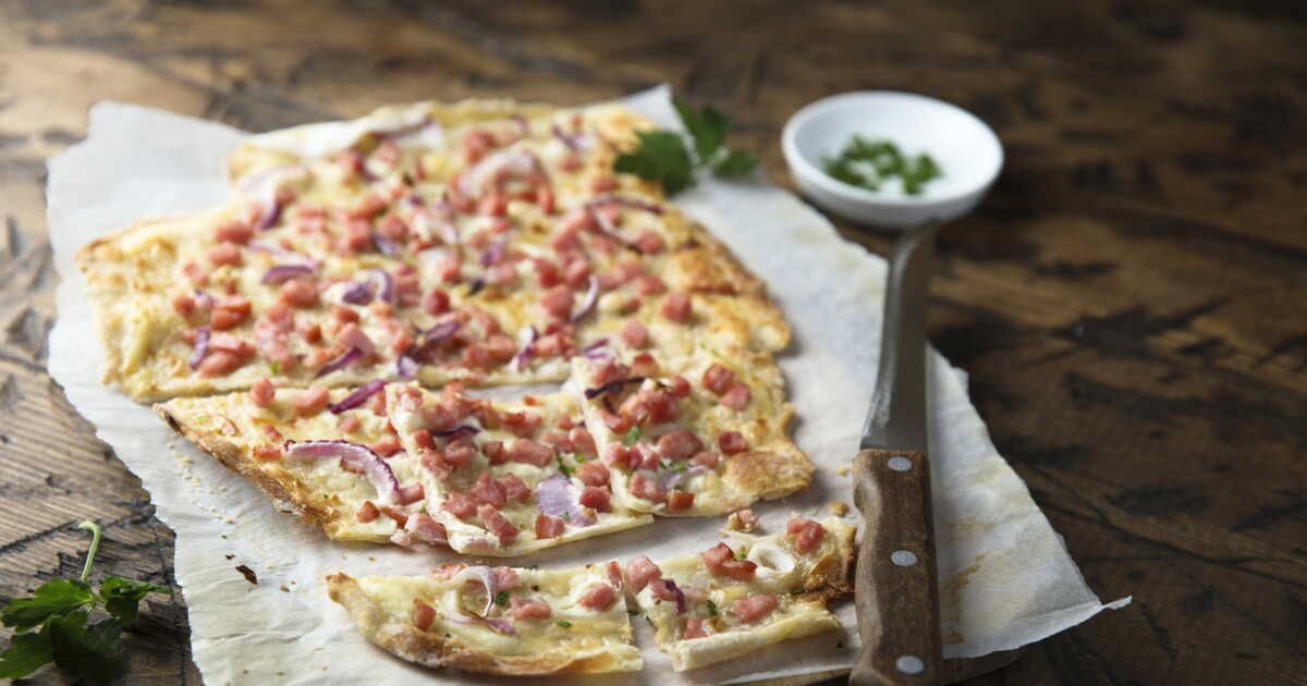 La tarte flambée au munster : un délice alsacien à savourer